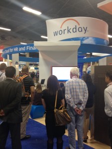Dave Duffield listens in on a demo at the Workday booth